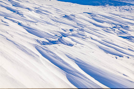 Wind blown sculptured snow patterns, Tongariro National Park, Ruapehu District, Manawatu-Wanganui Region, New Zealand (NZ)