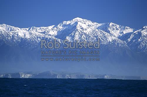 Snow covered Seaward Kaikoura Mountains from the sea, Kaikoura, Kaikoura District, Canterbury Region, New Zealand (NZ)