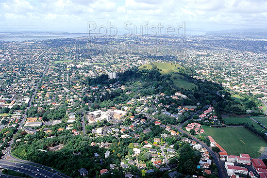 The scoria volcano cone of Mount (Mt) Eden (196m) in the suburb of Mount Eden, Auckland, Auckland City District, Auckland Region, New Zealand (NZ)