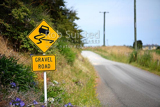 Gravel Road warning sign where tarseal road becomes an unsealed dirt road, New Zealand (NZ)