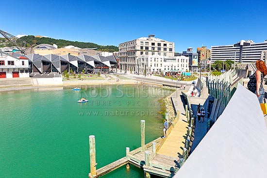 Wellington waterfront city lagoon with historic Rowing club, Wharewaka, Odlins and St Johns Ambulance buildings, taken from city to sea bridge, Wellington, Wellington City District, Wellington Region, New Zealand (NZ)