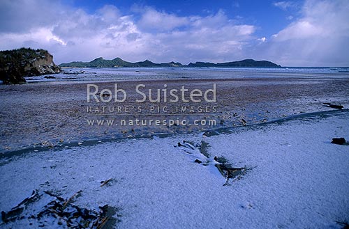 Snow on the beach! Cavalier Creek, Masons Bay, Stewart Island, Stewart Island, Stewart Island District, Southland Region, New Zealand (NZ)