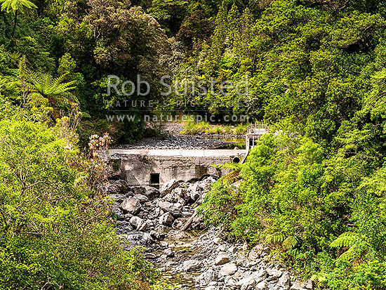 Wellington Water water collection weir on the Orongorongo River. Unseasonally low river level with a dry weir, Remutaka Range, Wainuiomata, Hutt City District, Wellington Region, New Zealand (NZ)