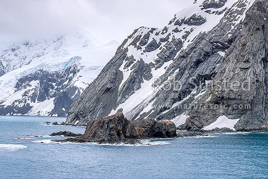 Point Wild on Elephant Island, where Shackleton's men stayed for 128 days (right). Ice-covered mountainous island in outer reaches of South Shetland Islands. Panorama, Elephant Island, Antarctica Region, Antarctica