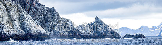 Rugged rocky shore of Cornwallis Island in the South Shetland Islands. Panorama. Granodiorite rock, Cornwallis Island, Antarctica Region, Antarctica