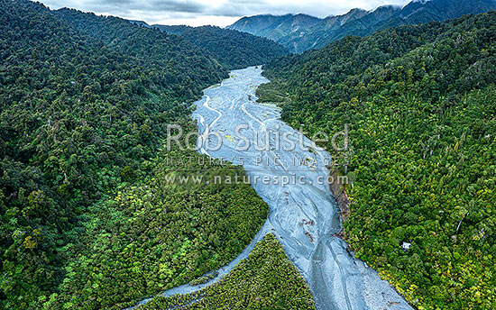 Orongorongo River Valley, looking upstream towards Papatahi (902m) on the Remutaka Range. Unique braided river of 1855 wairarapa earthquake debris working downstream. Aerial view, Remutaka Forest Park, Hutt City District, Wellington Region, New Zealand (NZ)