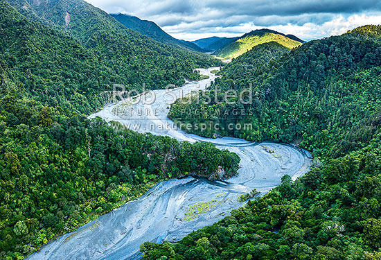 Orongorongo River Valley, looking downstream past Big Bend. Unique braided river of 1855 wairarapa earthquake debris working downstream. Aerial view, Remutaka Forest Park, Hutt City District, Wellington Region, New Zealand (NZ)