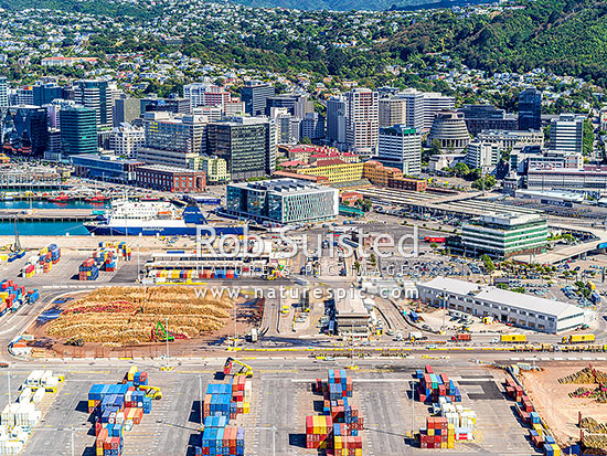 Wellington City with Wellington Port Container Terminal in foregroung and Wellington CBD, Railway Station, The Beehive and Parliament beyond. Aerial view, Wellington, Wellington City District, Wellington Region, New Zealand (NZ)