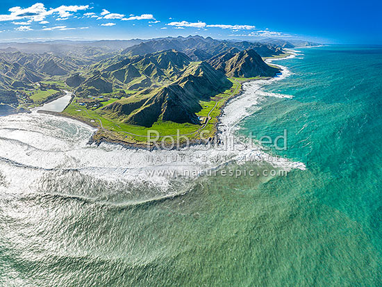 Te Awaiti and Greentops Stations at the Oterei River mouth at Tora. Aerial view looking north along the Wairarapa coast and farmland, Tora, South Wairarapa District, Wellington Region, New Zealand (NZ)