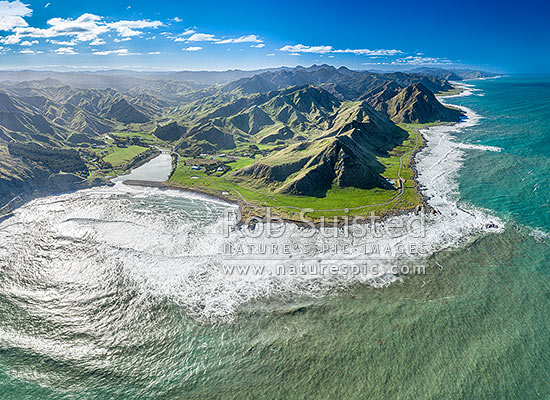 Te Awaiti and Greentops Stations at the Oterei River mouth at Tora. Aerial view looking north along the Wairarapa coast and farmland, Tora, South Wairarapa District, Wellington Region, New Zealand (NZ)