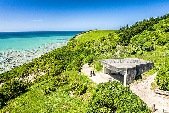 Oamaru coast and Cape Wanbrow with concrete WWII coastal defence battery on walking track above Cape Wanbrow. Aerial view, Oamaru, Waitaki District, Canterbury Region, New Zealand (NZ)