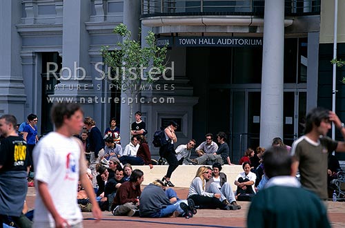 People in Civic Square sitting outside the town hall auditorium, Wellington, Wellington City District, Wellington Region, New Zealand (NZ)