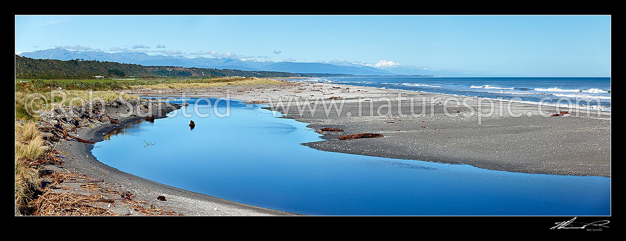 Image of Kumara beach coastline looking south along southern Alps to Aoraki Mount Cook and Tasman. Serpentine Creek estuary. Coast to Coast race starting point, Kumara, West Coast, Westland District, West Coast Region, New Zealand (NZ) stock photo image