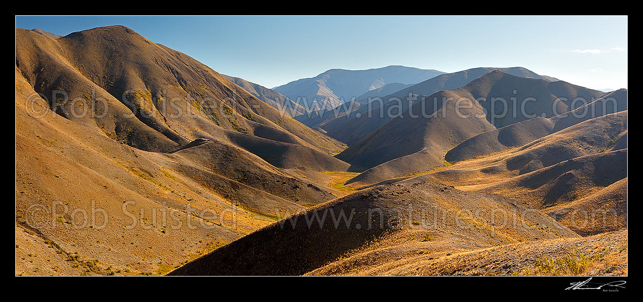 Image of Looking down the Dillion River from headwaters from near Carters Saddle (1175m). Panorama, Molesworth Station, Marlborough District, Marlborough Region, New Zealand (NZ) stock photo image