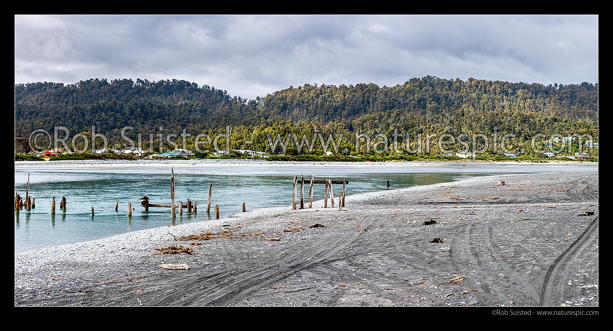 Image of Okarito township by the Lagoon and River mouth with recreational fisherman trying for Kahawai fish. South Westland. Panorama, Okarito, Westland District, West Coast Region, New Zealand (NZ) stock photo image