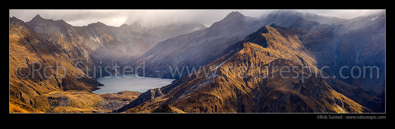 Image of Lochnagar (Lake Lochnagar) above the Shotover River, in the Richardson Mountains and Shotover Conservation Area. Cleft Peak (2250) in cloud. Panorama, Shotover River, Queenstown Lakes District, Otago Region, New Zealand (NZ) stock photo image