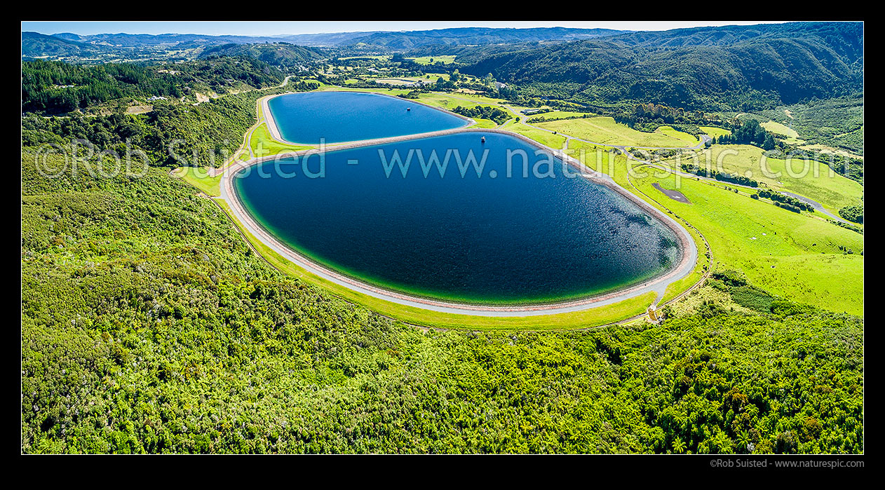 Image of Greater Wellington Regional Council municipal water storage lakes and public look out platform. Stuart Macaskill water collection and supply lakes with 3,000 million litre capacity. Aerial panorama, Te Marua, Wellington Region, New Zealand (NZ) stock photo image