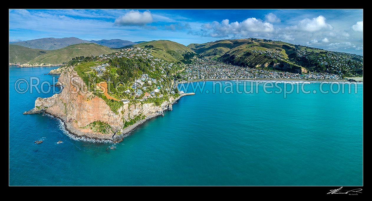 Image of Sumner Head and Sumner Beach (right) with the Port Hills and Mt Pleasant Tauhinukorokio above right. Aerial panorama, Sumner, Christchurch City District, Canterbury Region, New Zealand (NZ) stock photo image