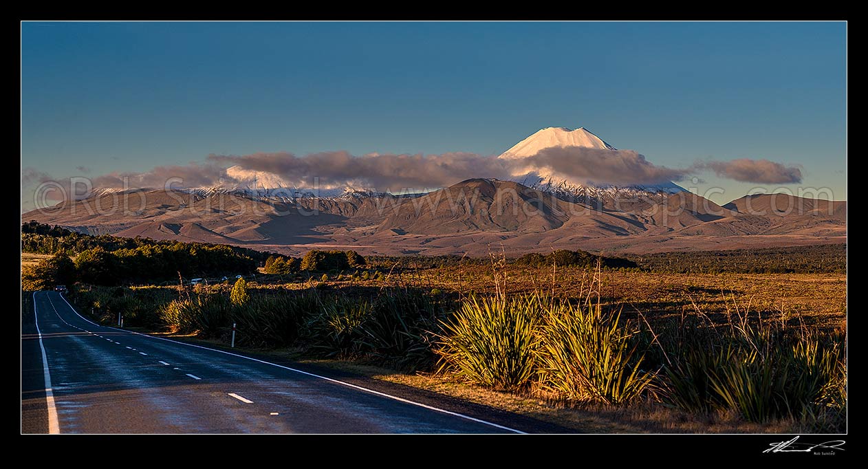 Image of Mt Ngauruhoe (2287m), a volcano in Tongariro National Park. Mount Tongariro obscured by cloud to left. Panorama from State Highway 47, Tongariro National Park, Ruapehu District, Manawatu-Wanganui Region, New Zealand (NZ) stock photo image