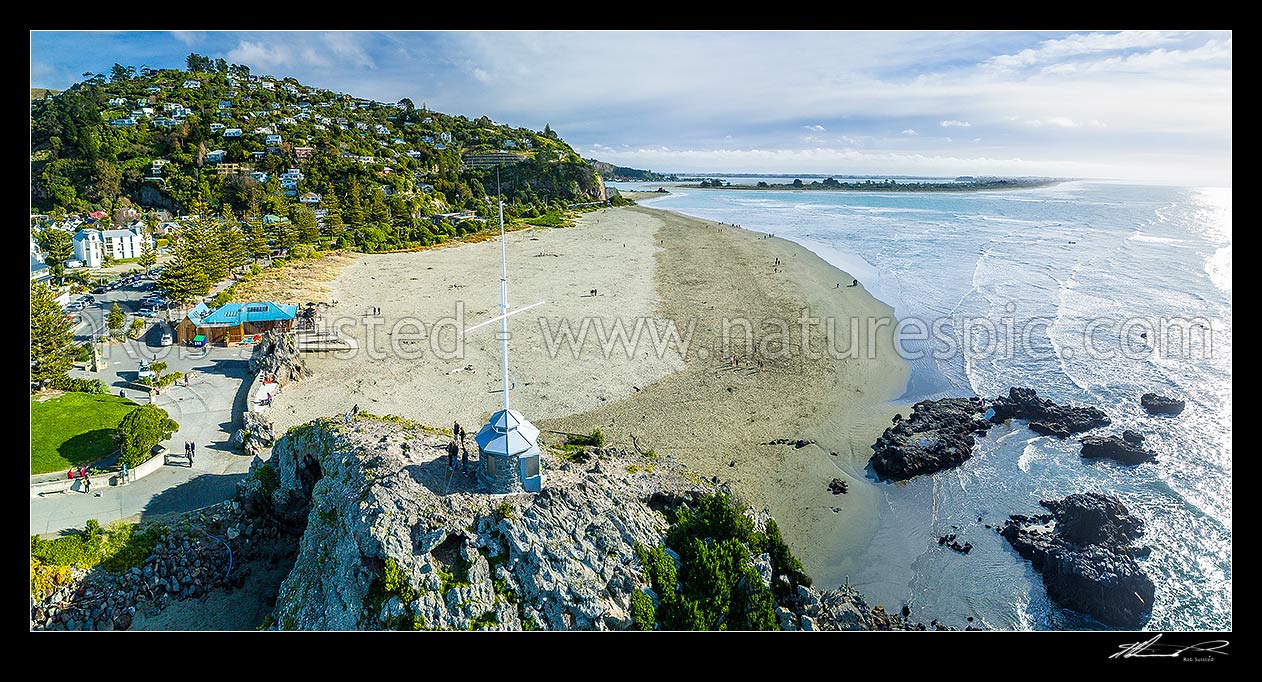 Image of Sumner Beach and Cave Rock with Heathcote Avon estuary (Ihutai) and New Brighton Beach beyond. Aerial panorama, Sumner, Christchurch City District, Canterbury Region, New Zealand (NZ) stock photo image