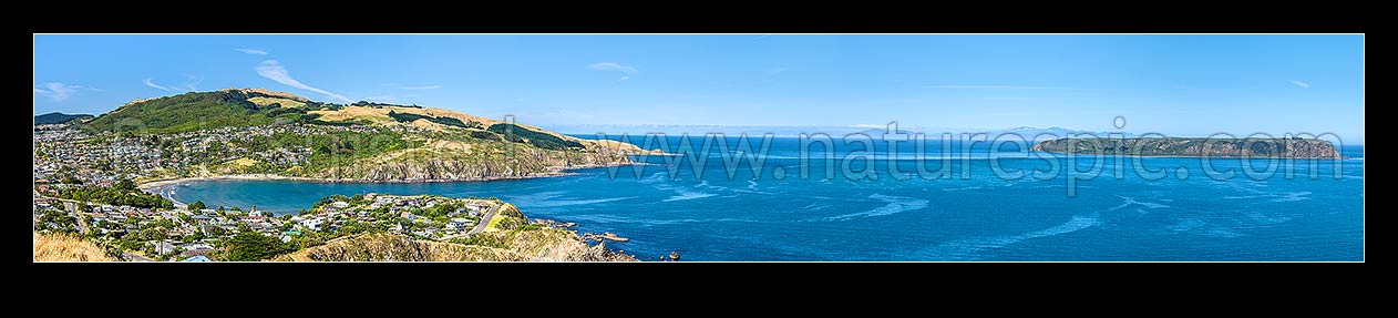 Image of Titahi Bay and Beach, looking across to Mana Island, with South Island behind across Cook Strait. Colonial Knob Scenic Reserve (468m) far left. Panorama, Titahi Bay, Porirua City District, Wellington Region, New Zealand (NZ) stock photo image