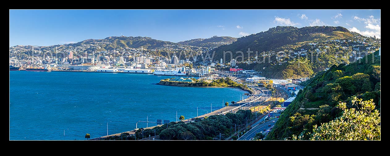 Image of Wellington City CBD, with SH1 motorway passing thru Kaiwharawhara and Thorndon. Tinakori centre, Wadestown suburb right. Panorama, Kaiwharawhara, Wellington City District, Wellington Region, New Zealand (NZ) stock photo image