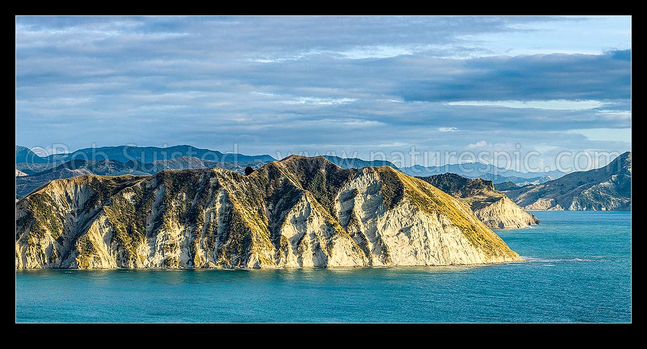 Image of Tolaga Bay northern cliffs and Te Karaka Point (right). Panorama, Tolaga Bay, Gisborne District, Gisborne Region, New Zealand (NZ) stock photo image