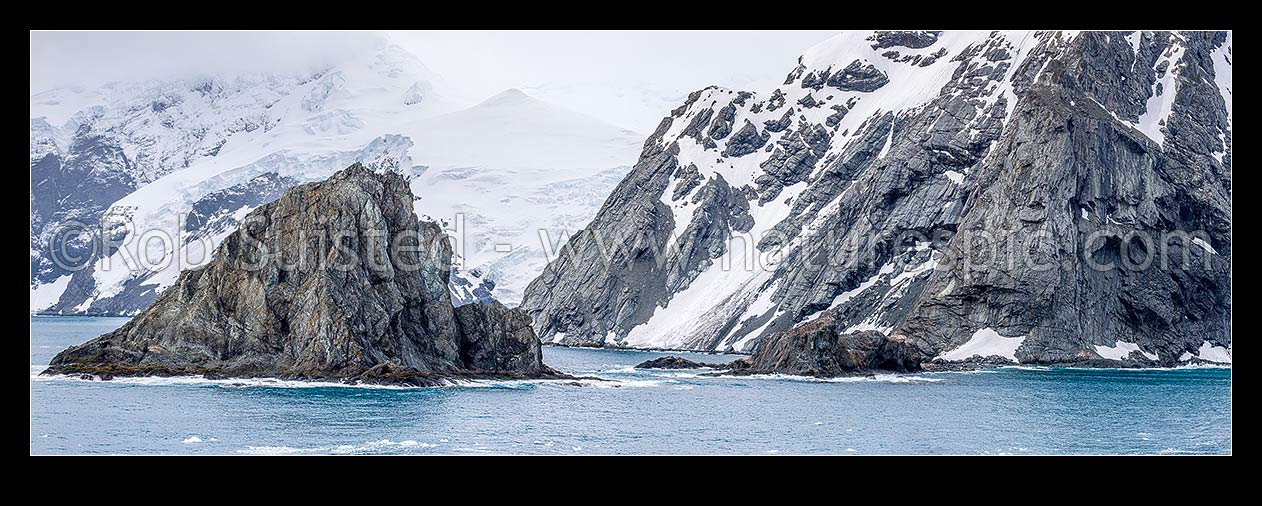 Image of Point Wild on Elephant Island, where Shackleton's men stayed for 128 days (centre). Ice-covered mountainous island in outer reaches of South Shetland Islands. Panorama, Elephant Island, Antarctica Region, Antarctica stock photo image