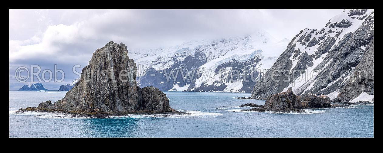 Image of Point Wild on Elephant Island, where Shackleton's men stayed for 128 days (right). Ice-covered mountainous island in outer reaches of South Shetland Islands. Panorama, Elephant Island, Antarctica Region, Antarctica stock photo image