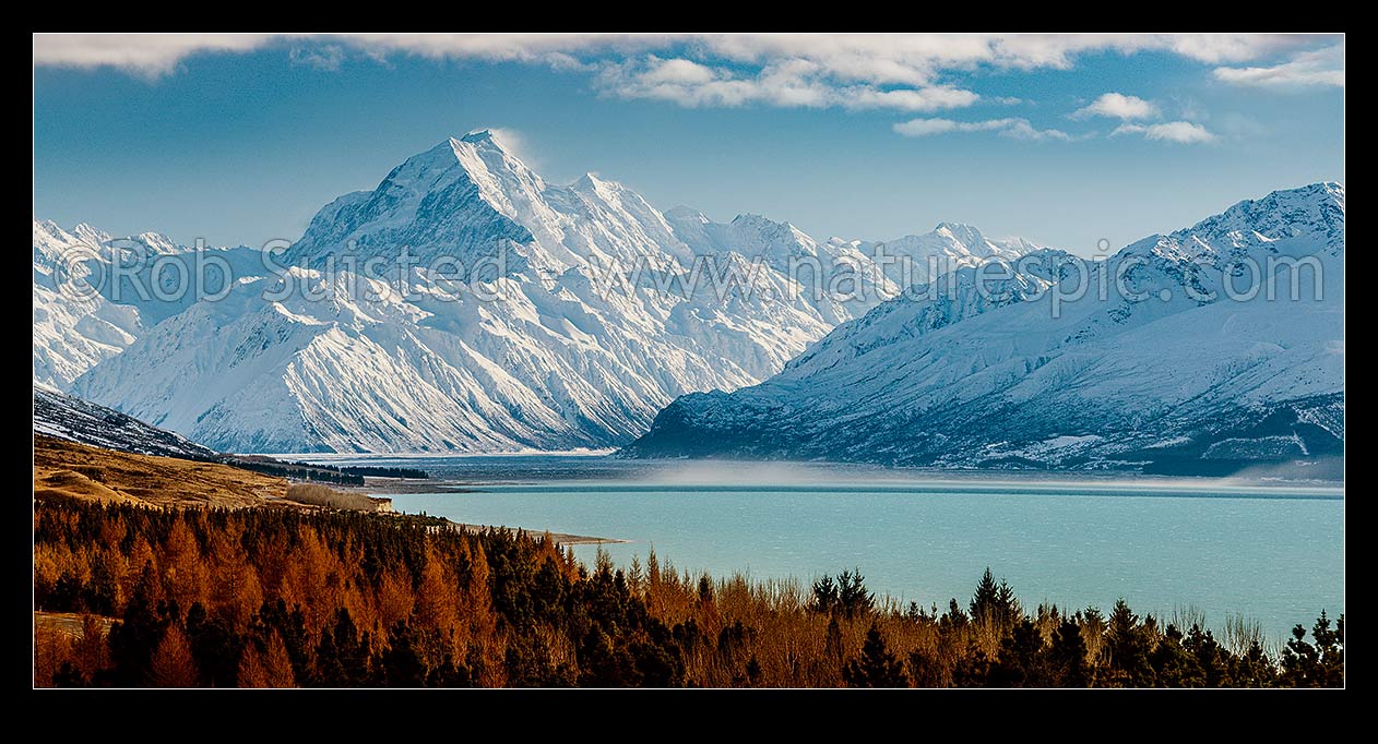 Image of Aoraki / Mount Cook (3754m) and Lake Pukaki in winter. Tasman Valley and Burnett Mountains Range right. Panorama with late autumn colours, Aoraki / Mount Cook National Park, MacKenzie District, Canterbury Region, New Zealand (NZ) stock photo image